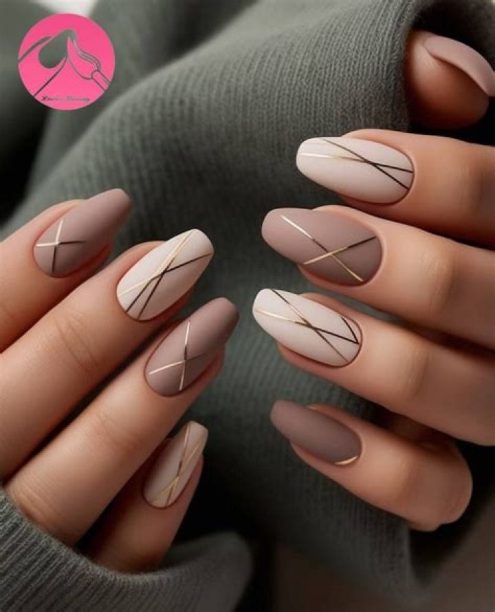 Minimalist negative space geometric nail art 2026
